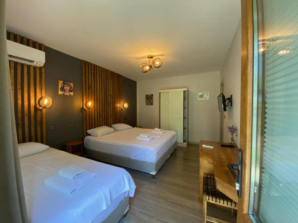 Elyada Otel Ve Bag Evi 8 Yas Ustu Бозджаада Екстериор снимка